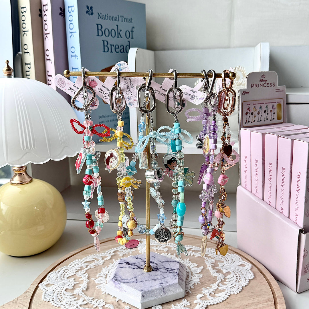 blind box phone charm accessories ใช้คู่เคส disney princess iphone samsung case ไอโฟน ซัมซุง เจ้าหญิง ดิสนีย์ โบว์ กล่องสุ่ม สายห้อยมือถือ คล้องโทรศัพท์ ariel belle cinderella jasmine rapunzel แอเรียล เบลล์ ซินเดอเรลล่า จัสมิน ราพันเซล มี secret สีทอง